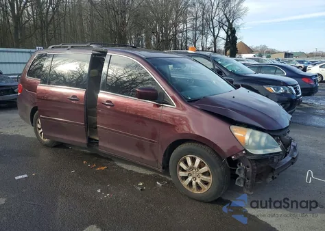 2010 Honda Odyssey Exl z USA, uszkodzony, nr VIN 5FNRL3H75AB058464